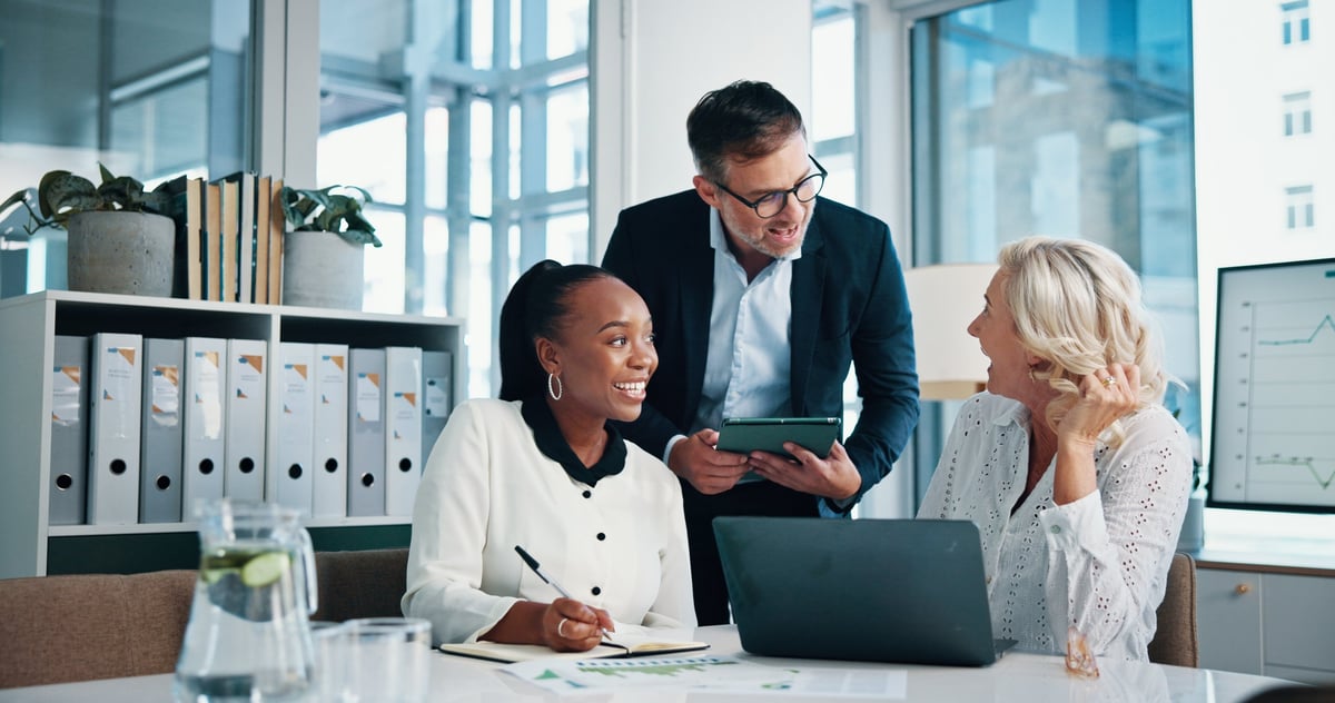 Accounting, office and business people with meeting, feedback and manager for laptop, discussion and graphs